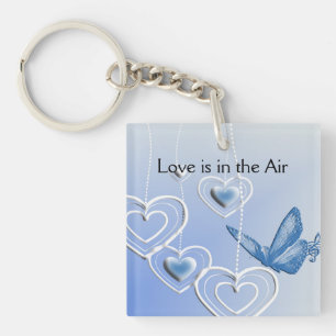 Llavero Una mariposa y corazones