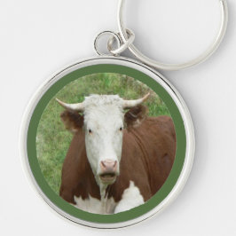 Llavero Una mirada divertida a una vaca en la cadena de cl