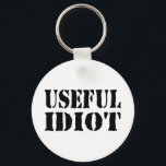 LLAVERO USEFUL IDIOT<br><div class="desc">USEFUL FOOL</div>
