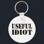 LLAVERO USEFUL IDIOT<br><div class="desc">USEFUL FOOL</div>