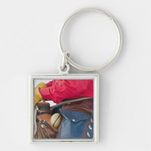 Llavero Vaquero en grietas del cuero del caballo que