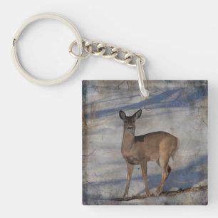 Llavero Venado en la nieve