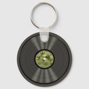 Llavero (verde) del disco de vinilo del vintage