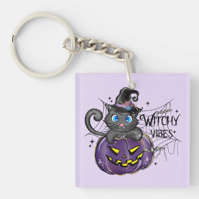 Llavero Vibes de cocina - Gato negro sobre un Jack-O-Lante (Frente)