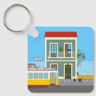 Llavero Vieja casa de Lisboa con gatos y tranvía amarillo