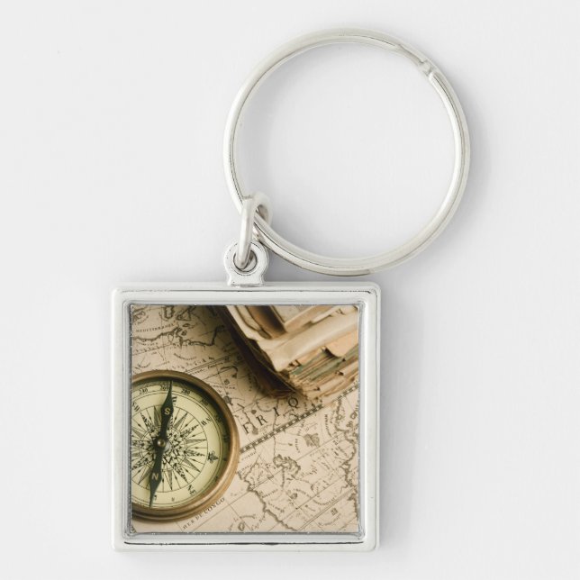 Llavero Viejo compás sobre mapa antiguo (Frente)