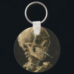 Llavero Vincent Van Gogh - Calavera con cigarrillo en llam<br><div class="desc">Vincent Van Gogh - Calavera con cigarrillo en llamas</div>