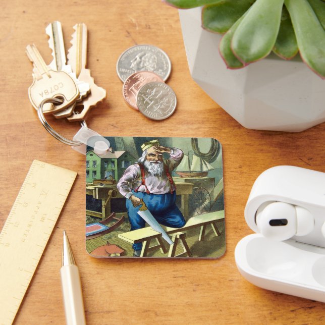 Llavero Vintage Christmas, Santa Claus construyendo juguet (Escritorio )