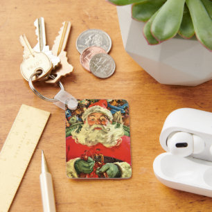 Llavero Vintage Papá Noel de Navidad en Sleigh con juguete