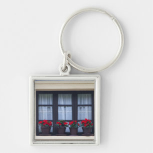 Llavero Viviendas con flores en ventanas