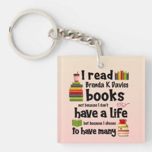 Llavero Vivo muchas vidas leyendo libros de Brenda K Davie