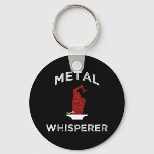 Llavero Whisperer Metalizado. Fundido metal de herrería