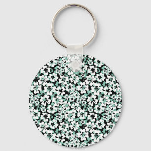 Llavero White, turquoise flowers on black.