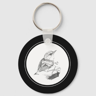 Llavero Wren Keychain en el lápiz