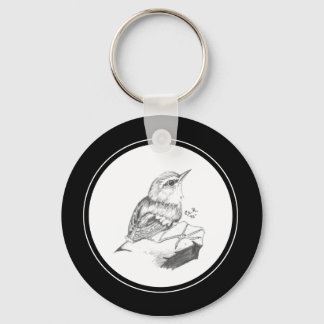 Llavero Wren Keychain en el lápiz