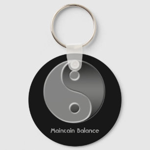 Llavero yin-yang, mantener el equilibrio