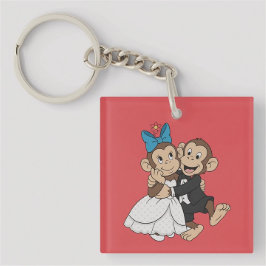 Llavero Zina y Mimo son los novios.