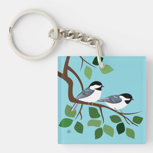 Llaveros capsulados negro de los Chickadees (Frente)
