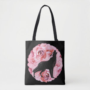 Lobo negro con la bolsa de asas rosada de los
