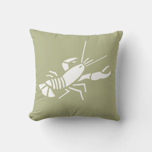 LOBSTER WHITE sobre almohada verde caqui