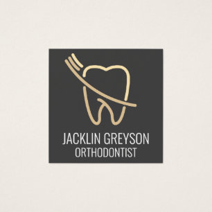 Logotipo de dientes y pinceles