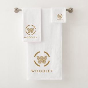 Logotipo de monograma dorado moderno en blanco