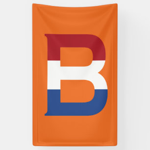 Lona B Monograma colocado sobre la bandera de la LND en