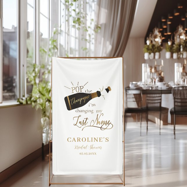 Lona ¡Pon el champán que estoy cambiando mi apellido! ("Pop the champagne, i´m changing my last name!" White, Bridal Shower Banner.)