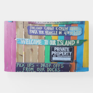 Lona Signo de la isla de la bienvenida colorida Carribe