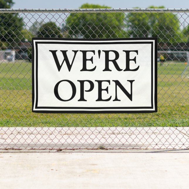 Lona Somos un negocio sencillo en blanco y negro (In situ)