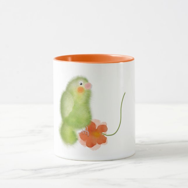 Loro verde con taza de flores de ORDesigns. (Centro)