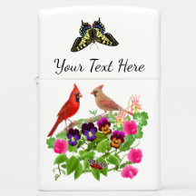 Los cardenales en jardín florecen el encendedor de