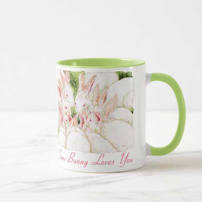 Los conejos blancos "algún conejito le aman" taza (Derecha)