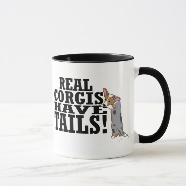 Los Corgis reales tienen taza de las colas (Derecha)