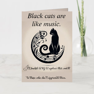 Los gatos negros son como una tarjeta de música