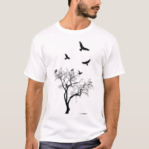 Los pájaros vuelan de la camiseta llevada y hecha