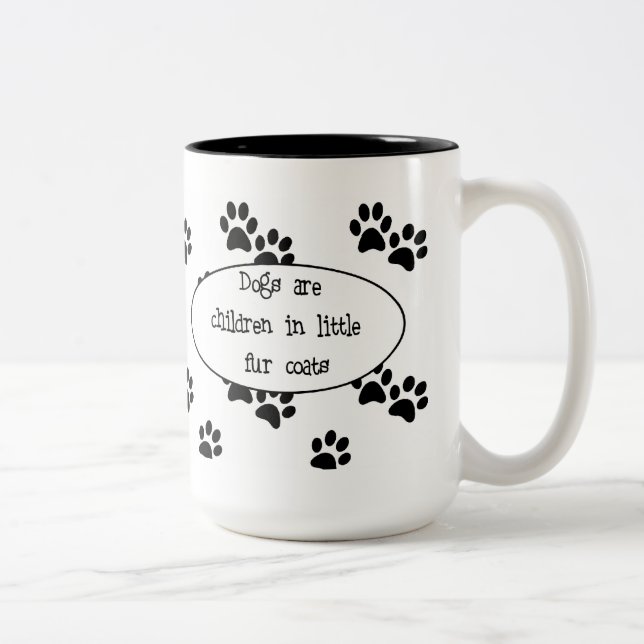 Los perros son niños en pequeña taza de los (Derecha)