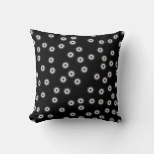 los puntos de polka brillantes arrojan almohada en