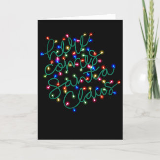 Luces de navidad Aquí viene la tarjeta de vacacion