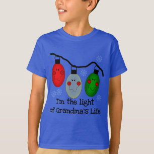 Luz de los regalos y camisetas de vacaciones de la