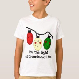 Luz de los regalos y camisetas de vacaciones de la