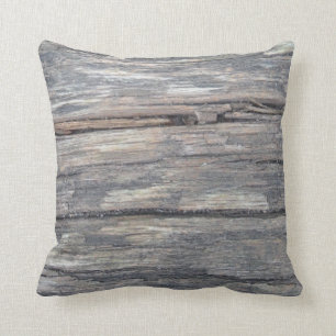 madera marrón gris: almohada gris marrón casi