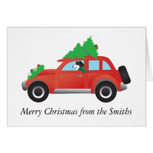 Malamute Manejando un coche árbol de Navidad en la