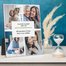 Mamás sosteniendo una placa citando a bebés en el 