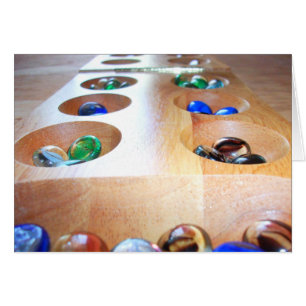 Mancala Board con piezas de juego