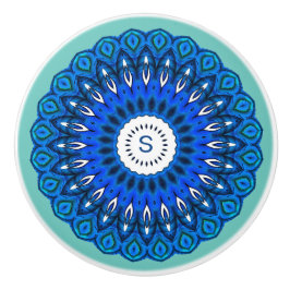 Mandala azul sobre turquesa con el pomo de la caje