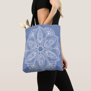 Mandala blanca exótica con fondo azul en la bolsa
