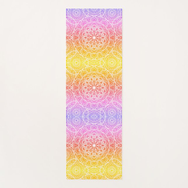 Mandala Yoga Mat rosa (A yoga mat with a gradient of colors from violet to yellow, with a pattern of white mandalas.)