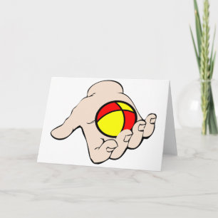 Mano con tarjetas de felicitación de bolas de mala