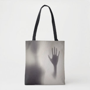 Mano espeluznante en la bolsa de tocador de Hallow